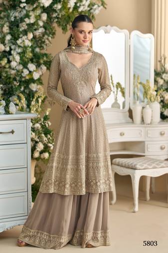 Beige free size full stitched upto 42 palazzo suits