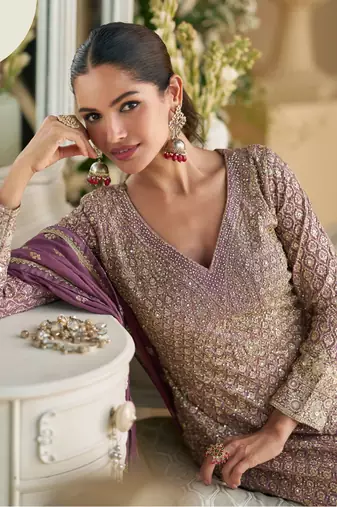 Purple free size full stitched upto 42 palazzo suit