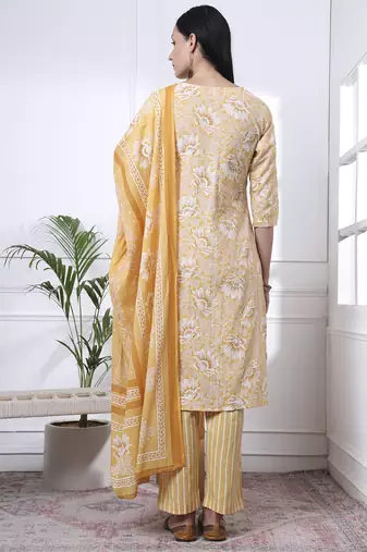 yellow floral print thread work straight kurta trouser dupatta set