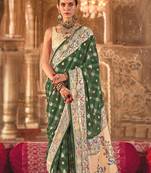 Green bandhej print silk blend saree