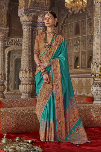 Turquoise printed silk blend embellished saree