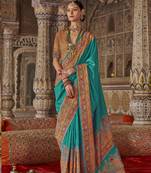 Turquoise printed silk blend embellished saree