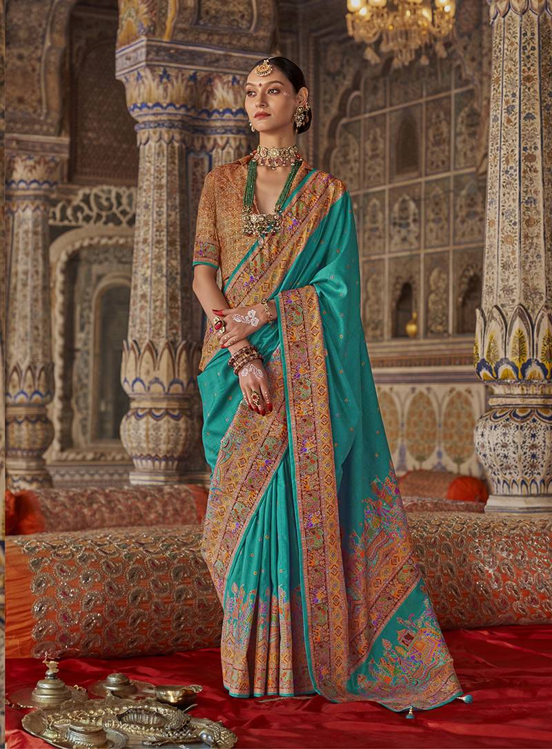 Turquoise printed silk blend embellished saree