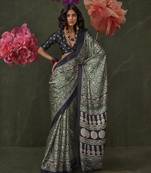 Green satin crepe printed saree