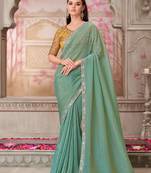 Sea green embroidered sequins and stone work satin silk saree