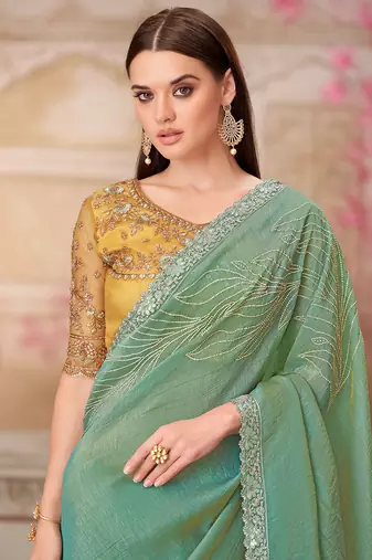 Sea green embroidered sequins work satin silk blend saree