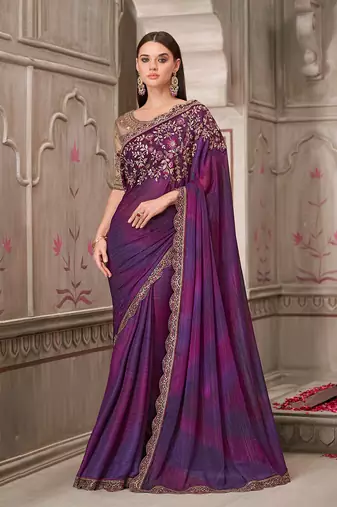 Purple satin georgette embroidered and stone work saree