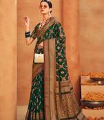 Dark green georgette woven saree