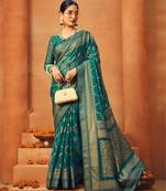 Teal georgette woven saree