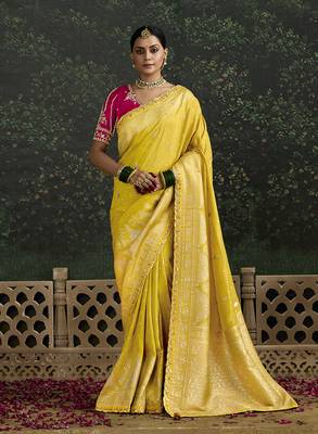 Sequins embroidered border work dola silk blend yellow saree 1