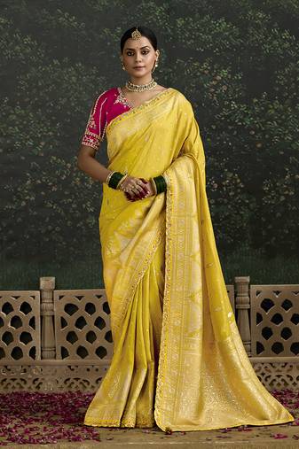 Sequins embroidered border work dola silk yellow saree