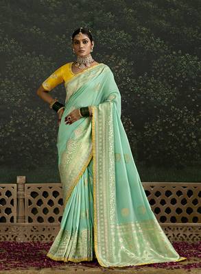 Sequins embroidered border work dola silk blend turquoise saree 1
