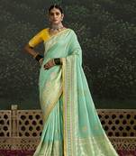 Sequins embroidered border work dola silk turquoise saree