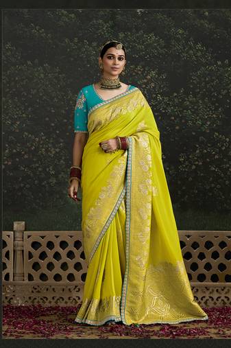 Sequins embroidered border work dola silk light olive green saree