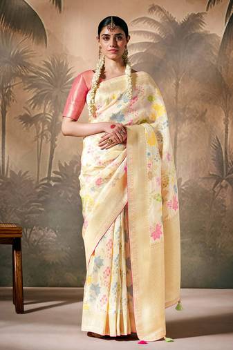 Silk floral pattern zari work cream saree