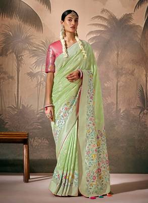 silk blend floral pattern zari work light green saree 1