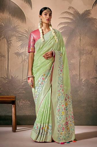Silk floral pattern zari work light green saree