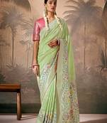 Silk floral pattern zari work light green saree