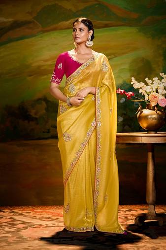 Yellow embroidered tissue saree
