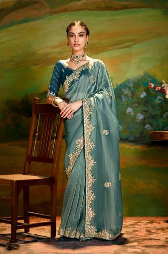 Teal embroidered tissue saree