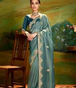 Teal embroidered tissue saree