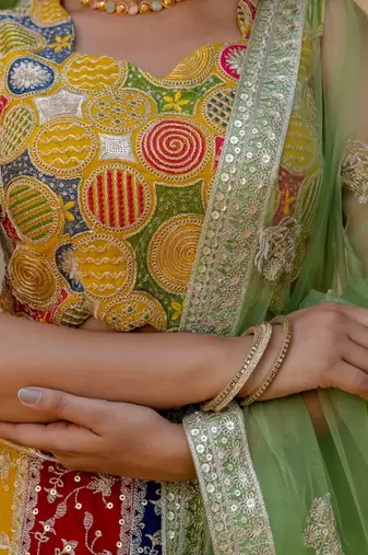 Multicolor Embroidered Georgette Lehenga Choli with Green Net Dupatta