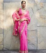 Fuschia pink silk zari woven embroidered saree