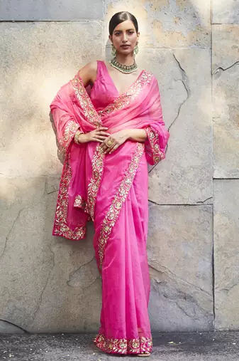 Fuschia pink silk zari woven embroidered saree