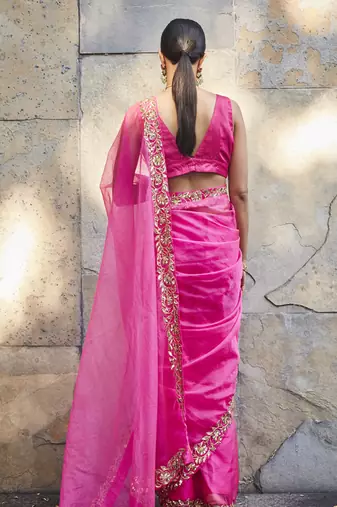 Fuschia pink silk zari woven embroidered saree
