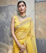 Yellow silk zari woven embroidered saree