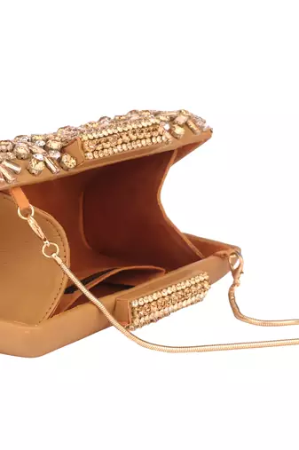 Golden studded clutch