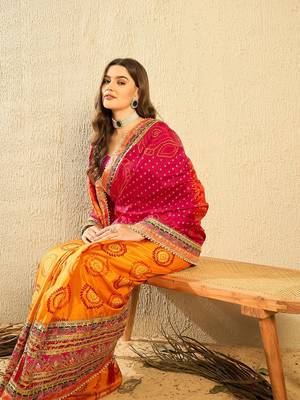 Pink bandhani saree with lace border and unstitched blouse 3