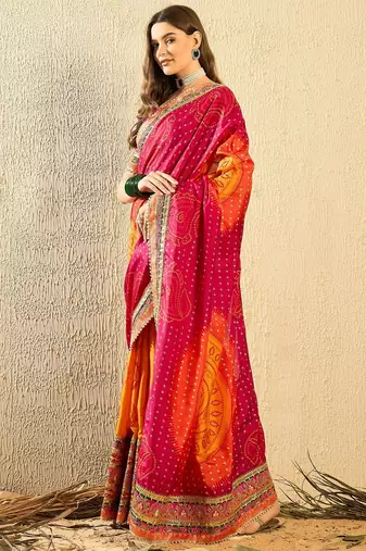 Pink bandhani saree with lace border and unstitched blouse
