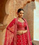 Red Silk Bridal Lehenga with Floral Motifs Sequins and Cutdana Embellishments
