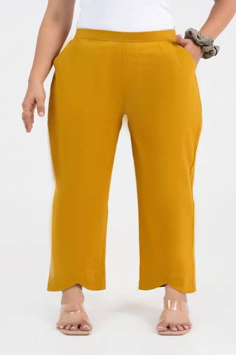 Mustard cotton  solid pant with leaf bottom