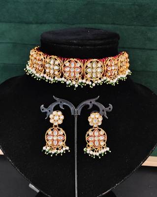 Elegant gold plated kundan choker necklace set with floral motifs, pearls, and matching earrings 3
