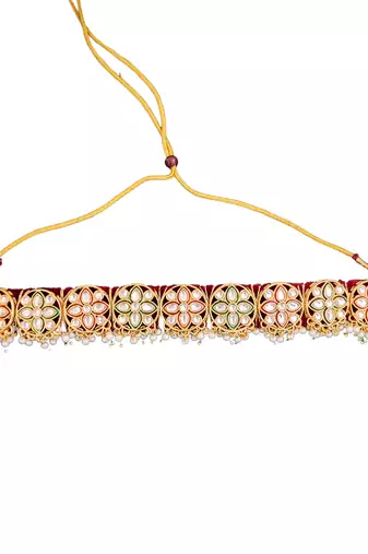 Elegant gold plated kundan choker necklace set with floral motifs, pearls, and matching earrings