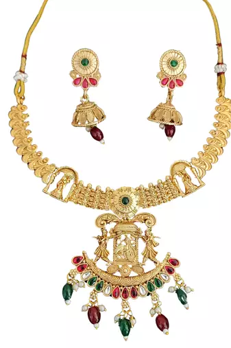 Temple jewellery rajwadi polish short necklace set with fancy design, red & green stones, and jhumka earrings.