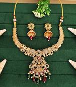 Gold plated elephant motif necklace set with red & green stones and jhumka earrings - elegant indian jewelry.