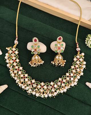 Multicolor gold plated jadau kundan necklace set with pearls and navratan style stones - perfect for festive occasions. 1