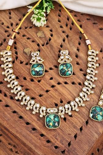 Kundan necklace set with green stones, earrings & maang tikka     mehendi polish    color may vary