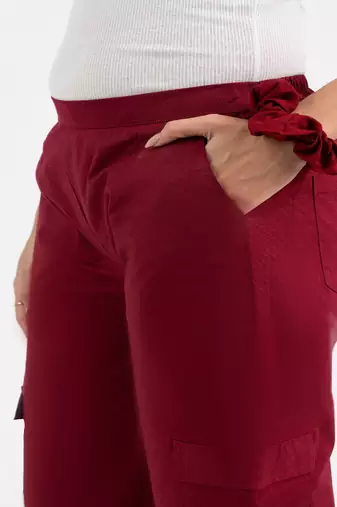 Maroon cotton  solid pant with leaf bottom