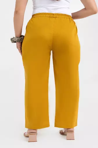 Mustard cotton  solid pant with leaf bottom