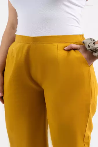 Mustard cotton  solid pant with leaf bottom