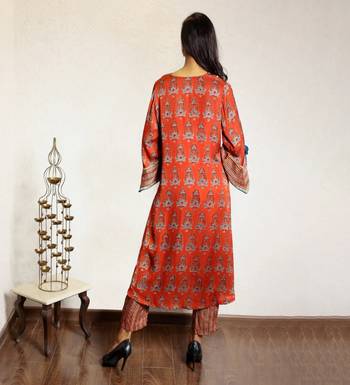 Red ajrakh printed modal silk kurta with exaggerated sleeves 4