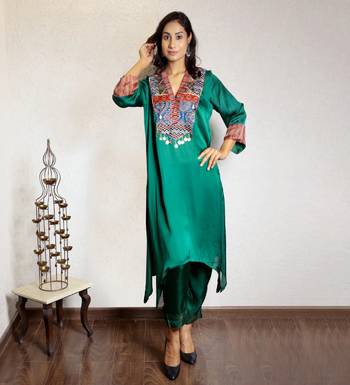Green asymmetric modal silk kurta set with ajrakh yoke detailing 1