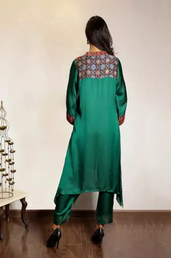 Green asymmetric modal silk kurta set with ajrakh yoke detailing