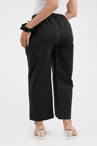Black cotton  solid pant with leaf bottom