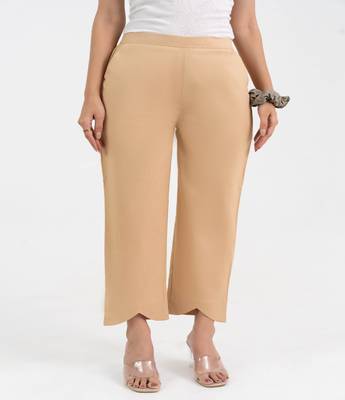 Beige cotton  solid pant with leaf bottom 2