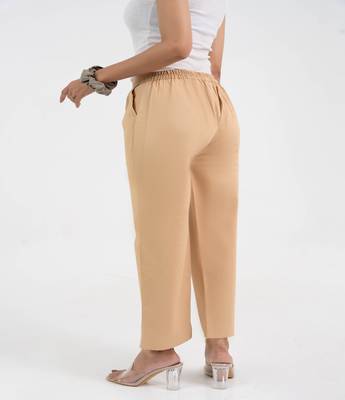 Beige cotton  solid pant with leaf bottom 3